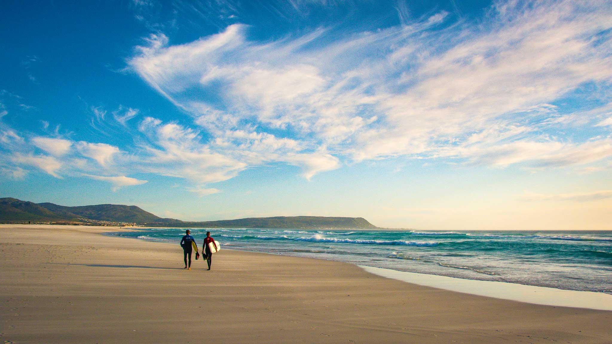 surfers on Noordhoek beach